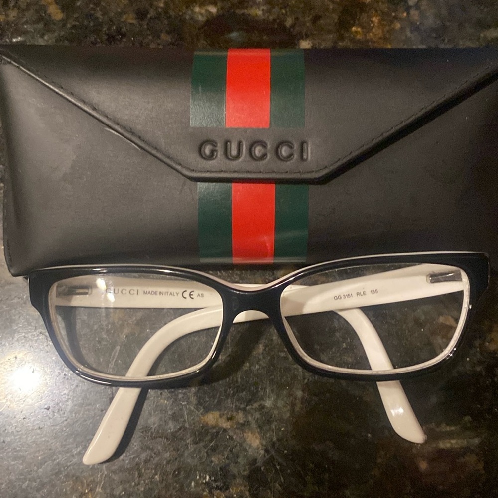 White Gucci female eyeglasses.